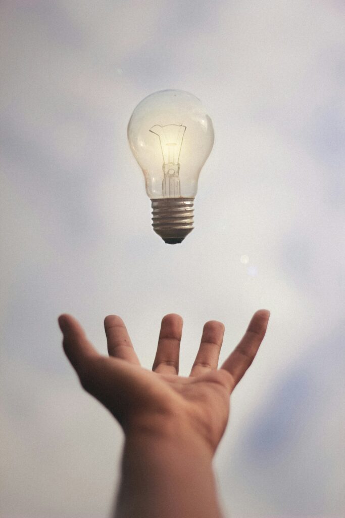 Lightbulb and hand