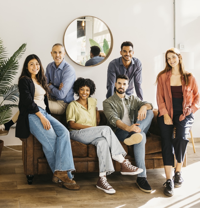 Diverse business professionals finding success working together in a modern startup office